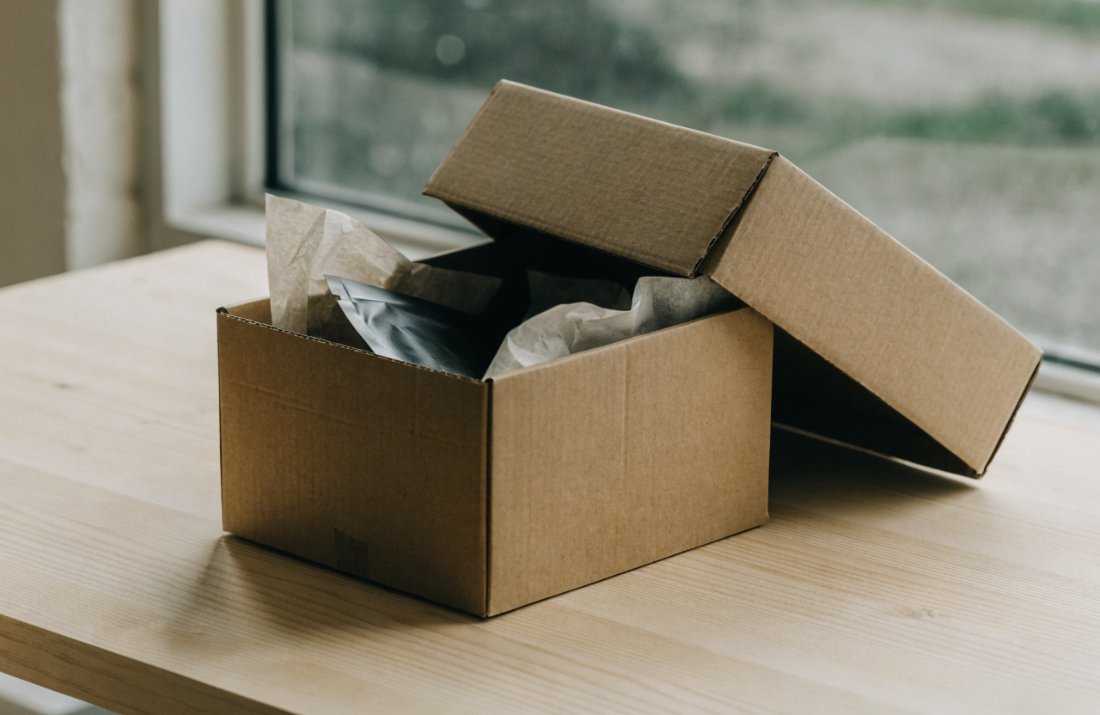 A discreet unmarked mailing box packed for cannabis delivery in Canada - Bud Cargo