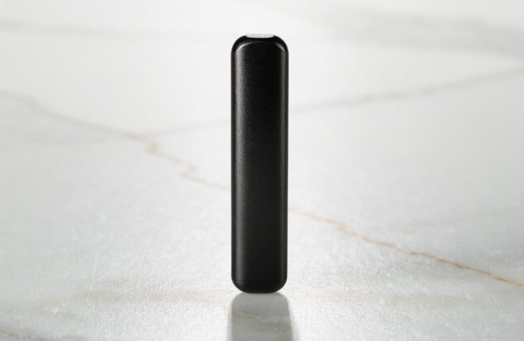 A slim matte black dual chamber THC vape pen - Bud Cargo