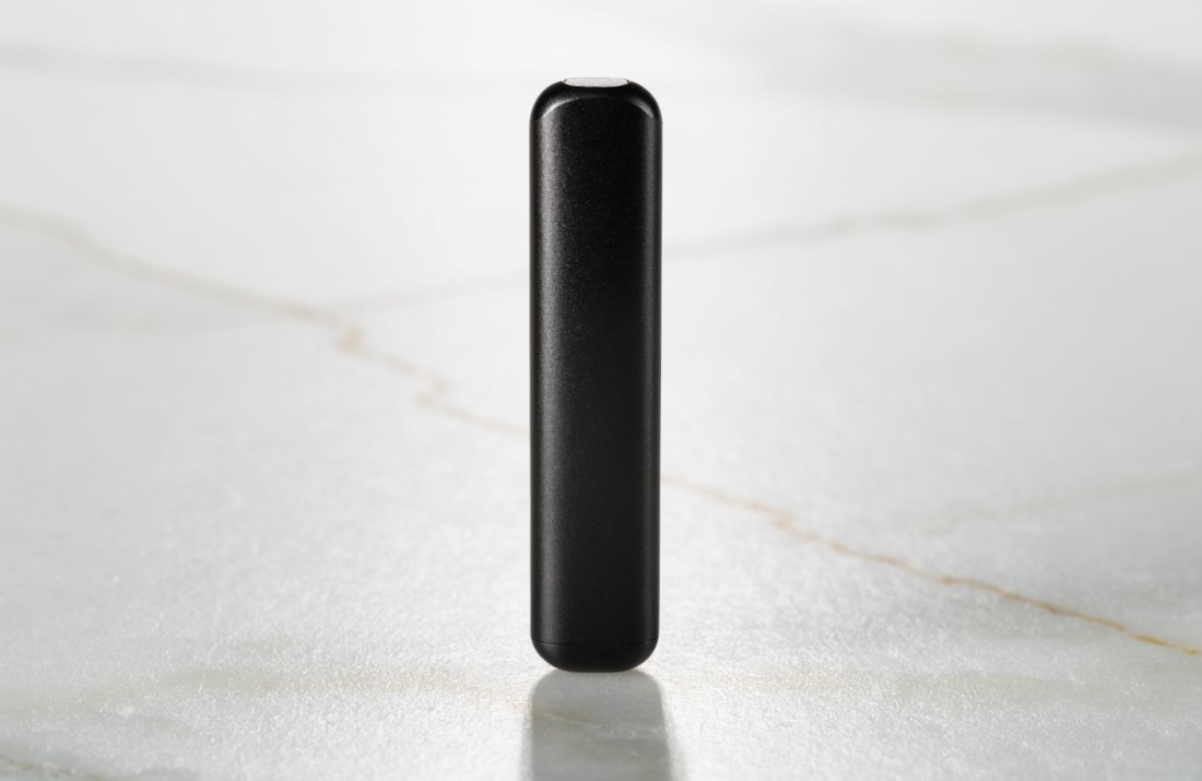 A slim matte black dual chamber THC vape pen - Bud Cargo
