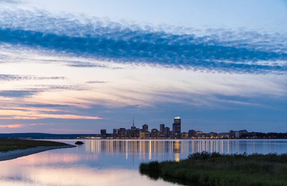 Winnipeg skyline at dusk across the river